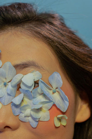 Flowers over a person's eyes