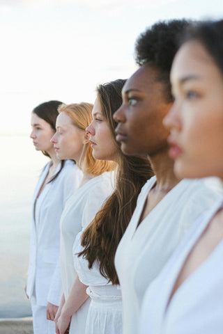 Photo of Women in White Outfit