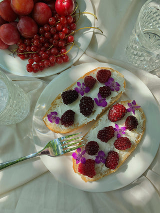 Artisan toast topped with berries and flowers