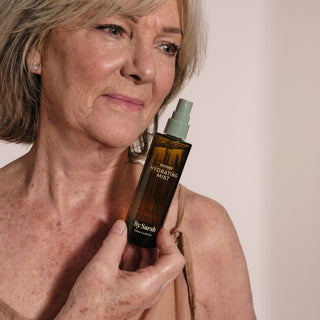 By Sarah Reviver Hydrating Mist with model